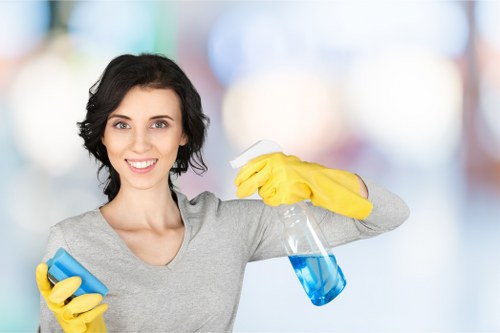 Team member inspecting cleaning equipment and safety controls before use
