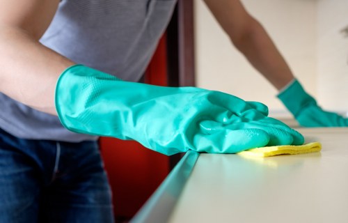 Close-up of fabric upholstery being treated during cleaning